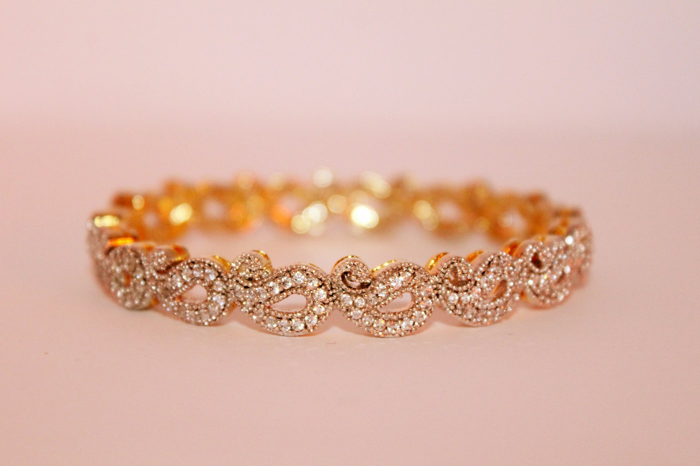Warm gold link bracelet with small stones